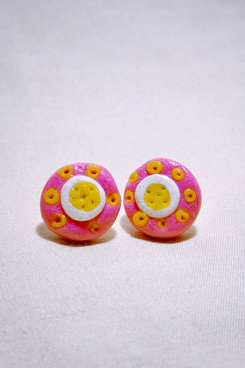 pink and yellow studs