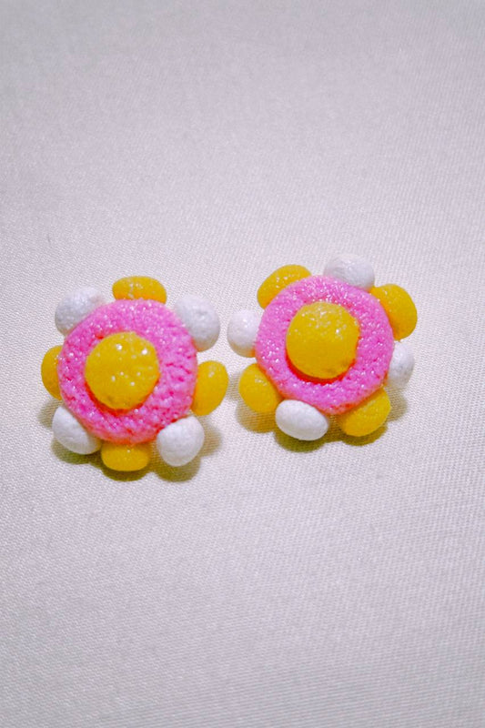 pink and yellow studs